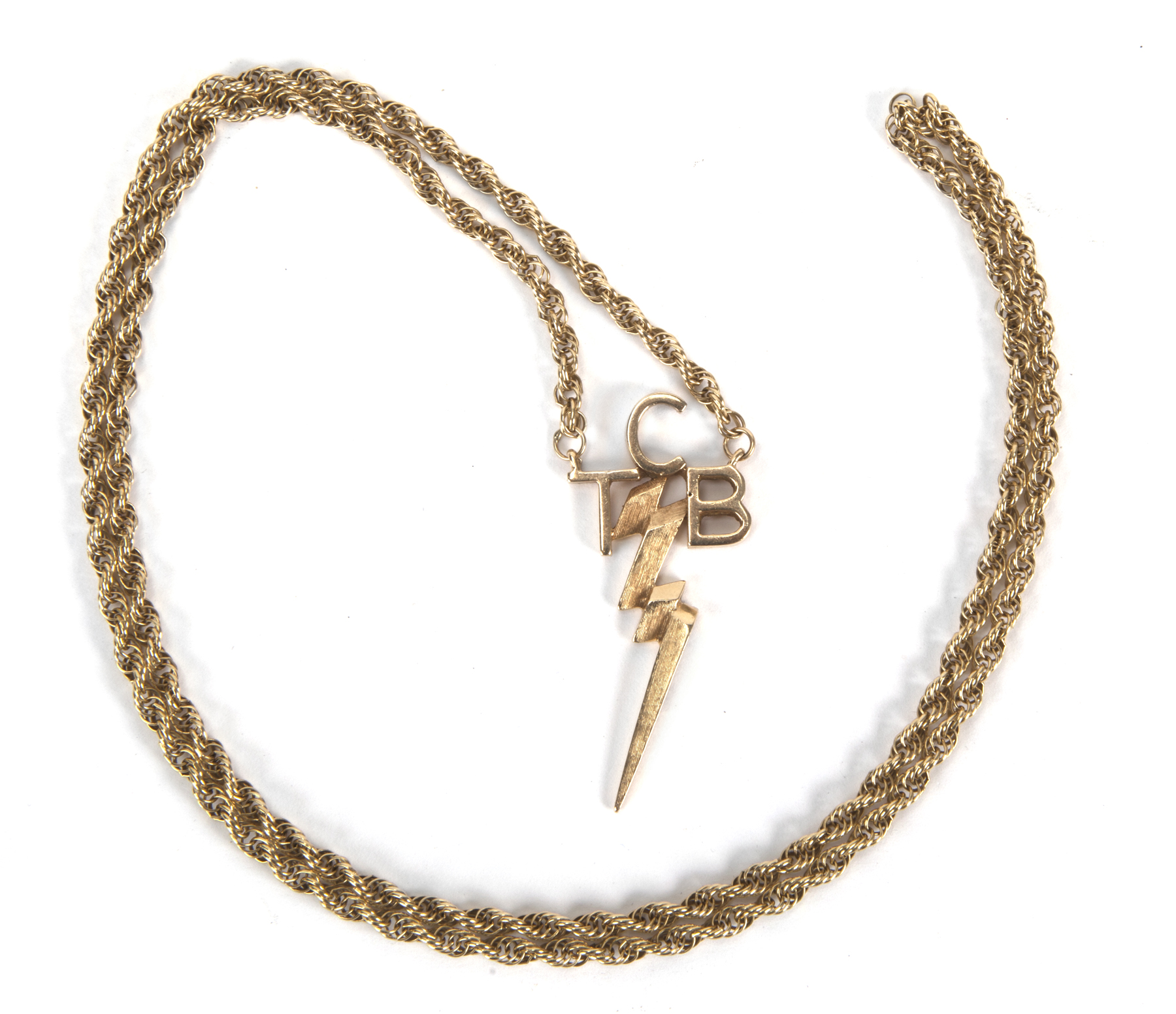 A TCB necklace that Elvis Presley gave to Sonny West per TheHotBid.com.